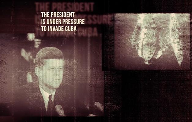 Screen showing TV broadcast with John Kennedy